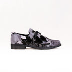 36 / NEWS PRINT LEATHER