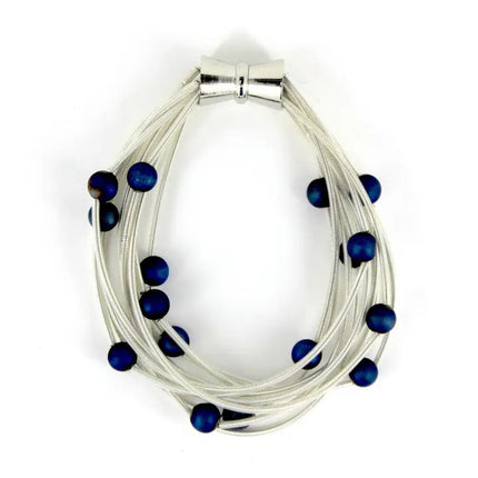 Sea Lily 10 Layer White Beaded Bracelet with Blue Geode